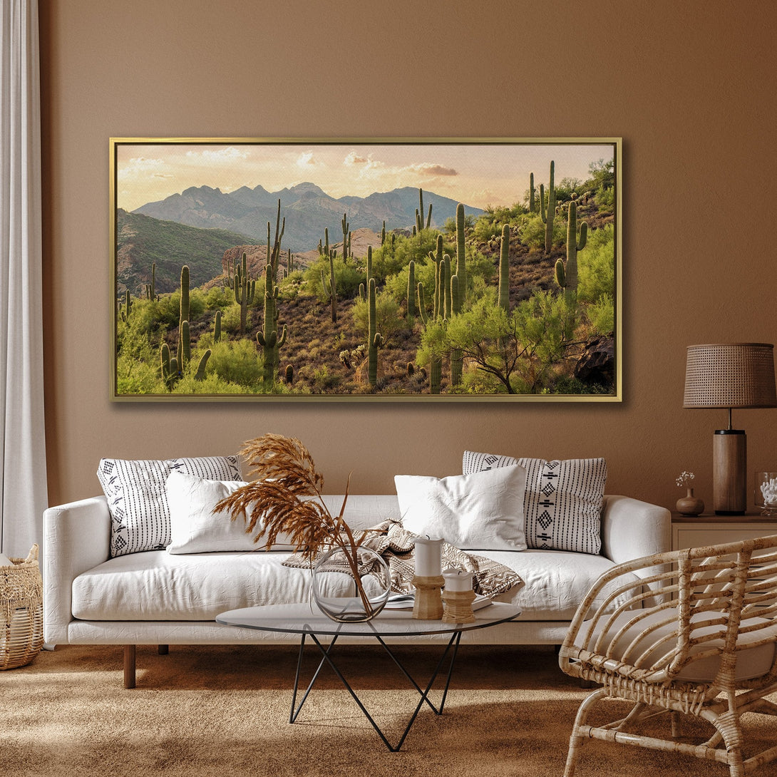 Canvas Print of a desert landscape featuring cacti and mountains, with warm earthy tones. Perfect wall art for living room decor.