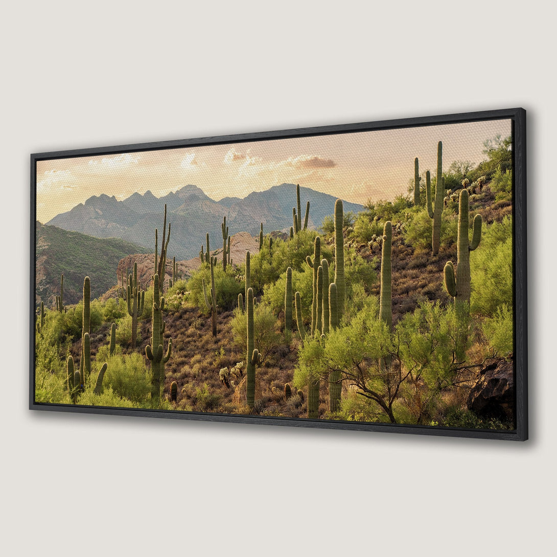 Framed Wall Art: Desert landscape Canvas Print featuring cacti and mountains, warm green and golden hues, perfect for adding a touch of nature.