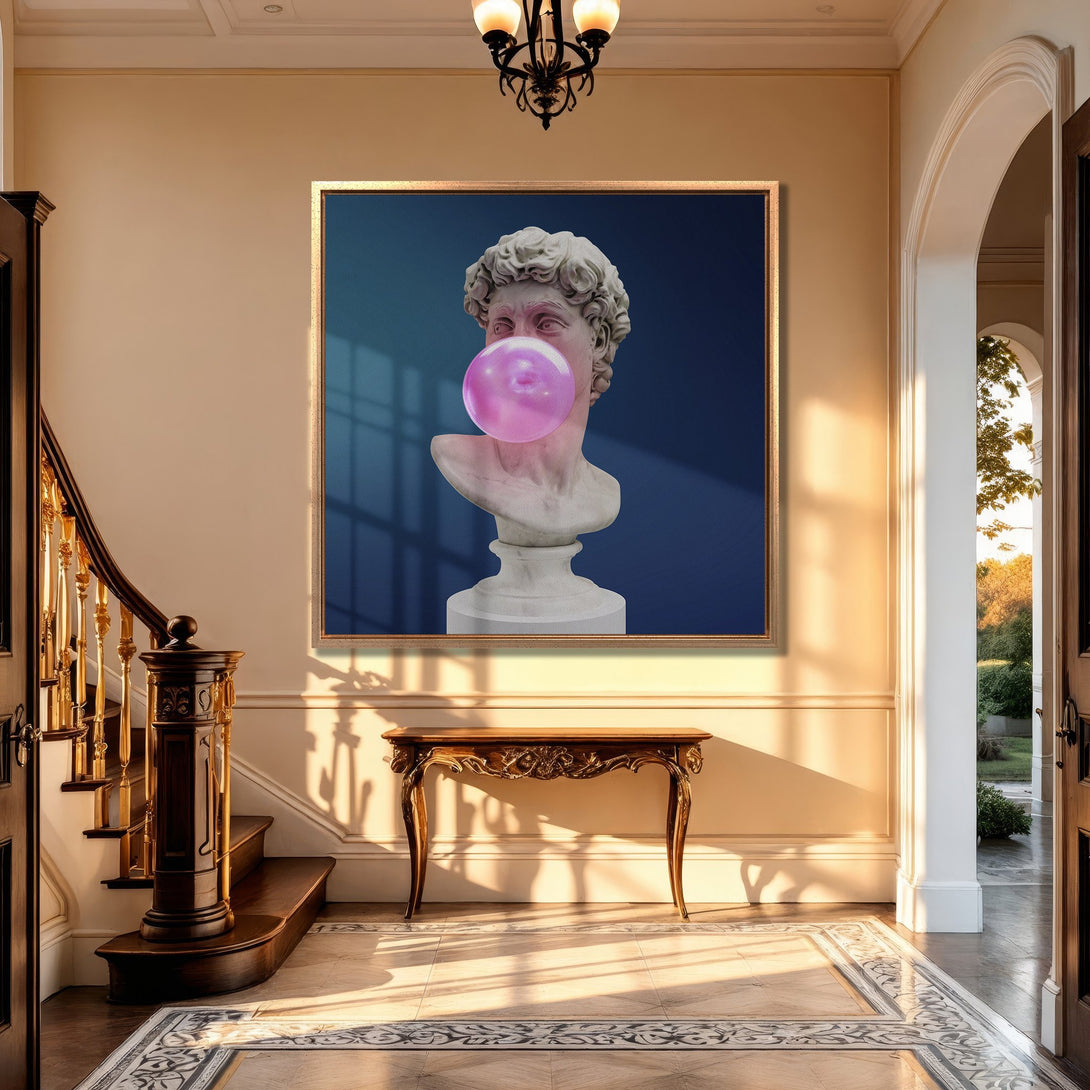 Framed Wall Art: David bust with bubblegum, modern pop art style, displayed in a luxury interior with a blue, pink, and gold color palette.