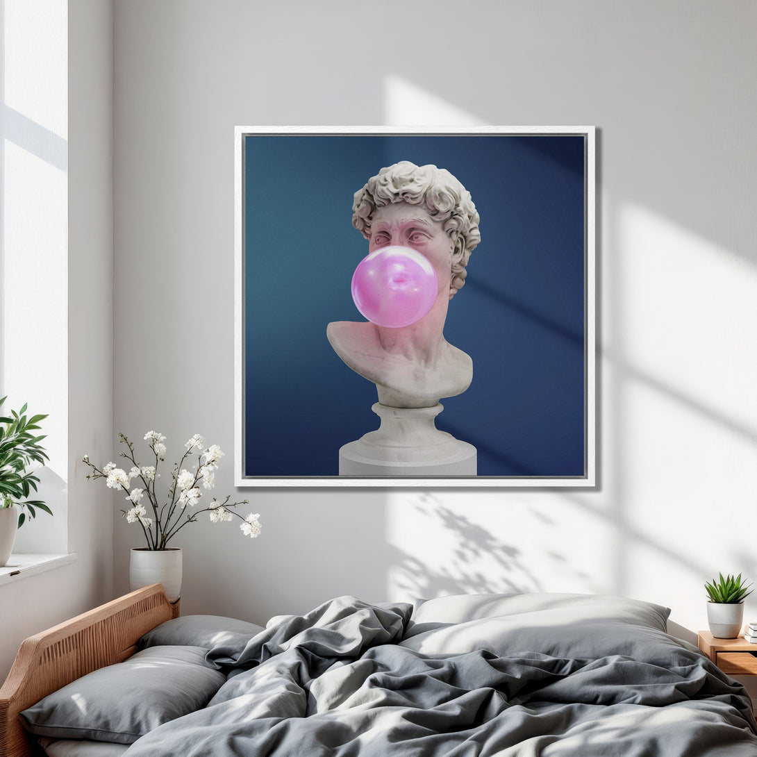Framed Wall Art featuring a classical bust blowing bubblegum. Modern art with a blue, pink, and white color palette. Perfect for bedroom decor.