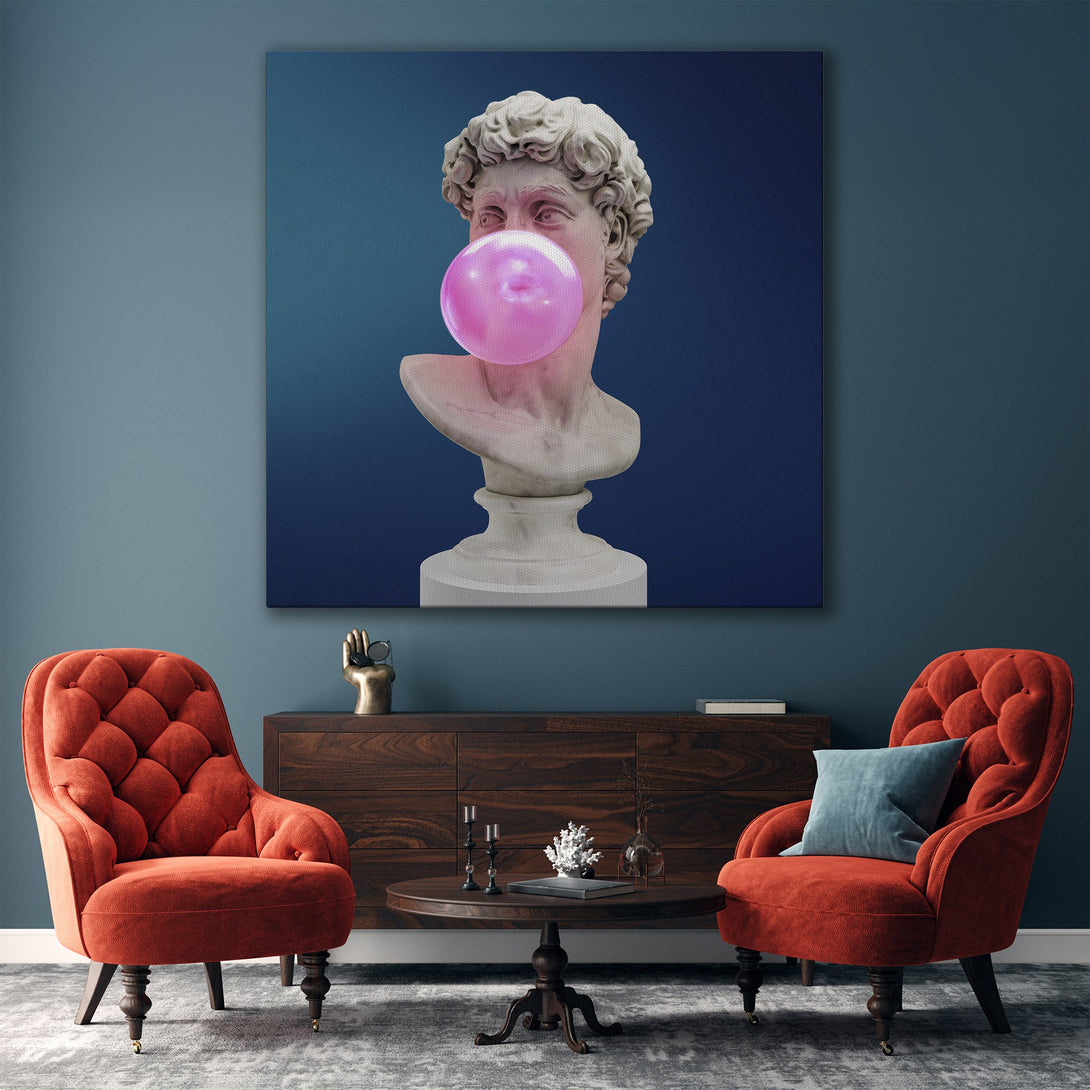 Framed Wall Art: David bust with bubblegum, modern art in a gold frame. Blue & pink color palette, stylish decor for living room.