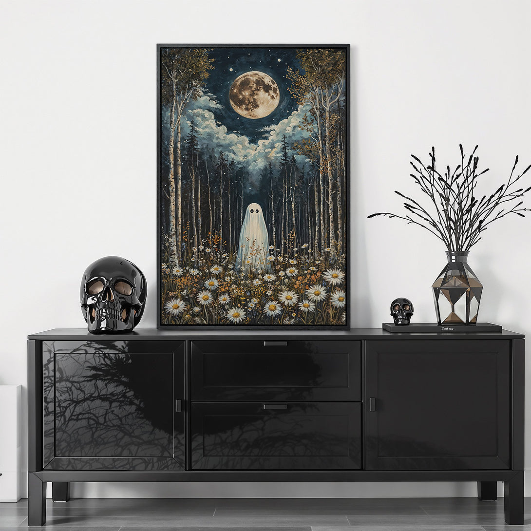 Framed Wall Art featuring a whimsical ghost in a moonlit forest scene. Moody, painterly style with a dark blue, green, and gold color palette. Perfect Halloween decor.