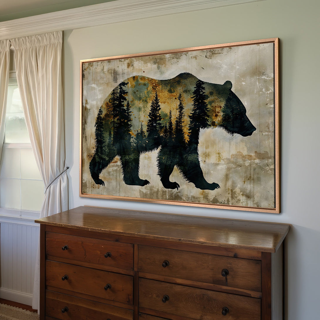 Framed Wall Art: Rustic bear silhouette canvas print with forest detail. Earthy color palette, perfect for cabin decor. Shop now!