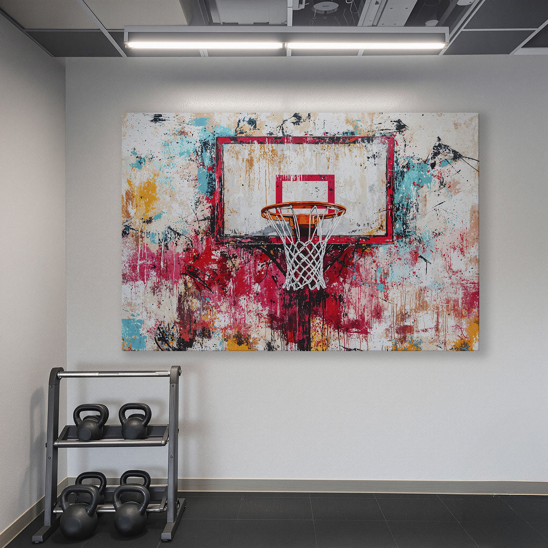 Framed Wall Art featuring a basketball hoop abstract art print. Vibrant red, blue, and yellow colors pop in this modern, sporty home gym.