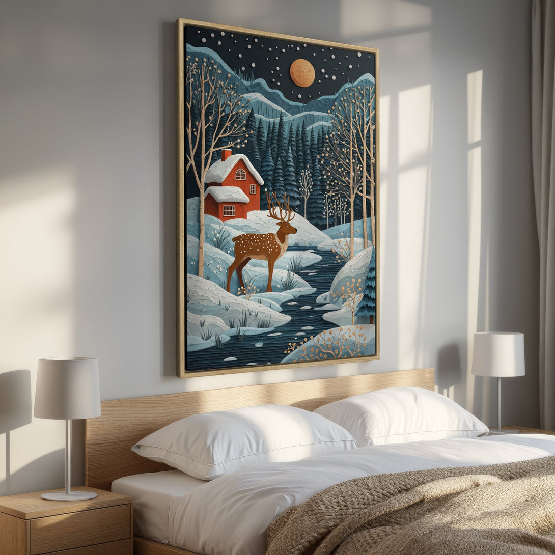 Framed Wall Art featuring a winter landscape with a deer, cabin, and moon. Stylized illustration in blue, brown, and red tones. Perfect for cozy decor.