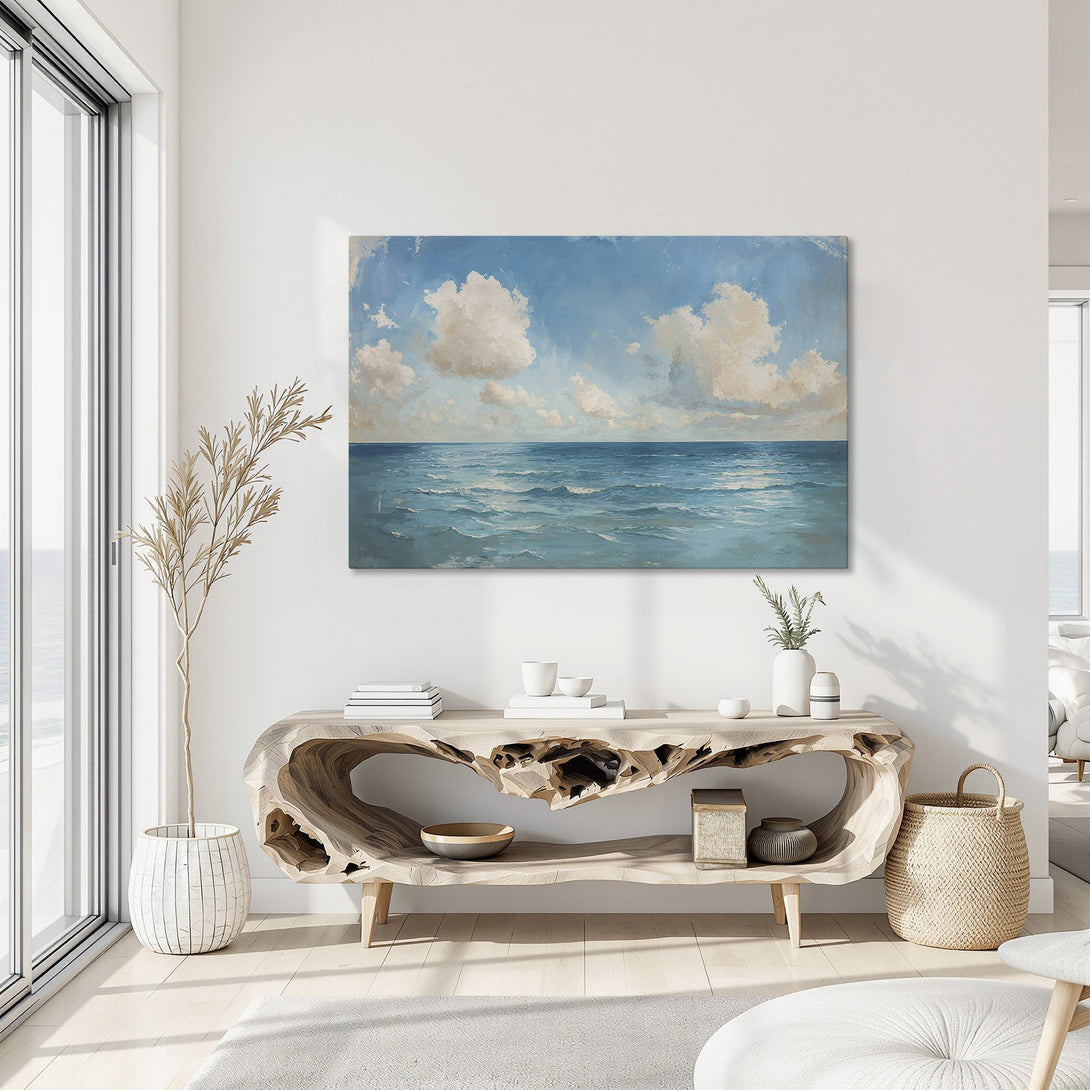 Framed Wall Art featuring a serene ocean scene in a modern, coastal style. Blue and white color palette creates a calming atmosphere. Perfect for home decor.
