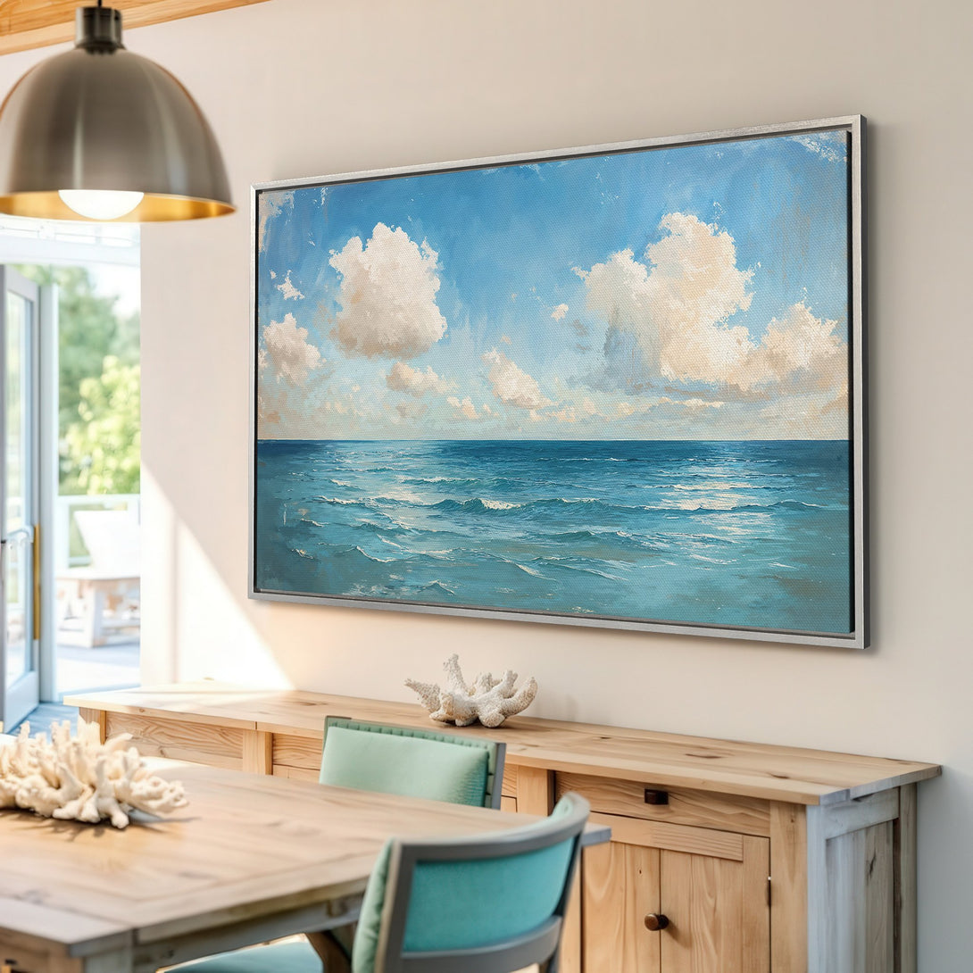 Framed Wall Art: Coastal landscape Canvas Print with ocean and sky in calming blue and white. Perfect for a serene home decor update.