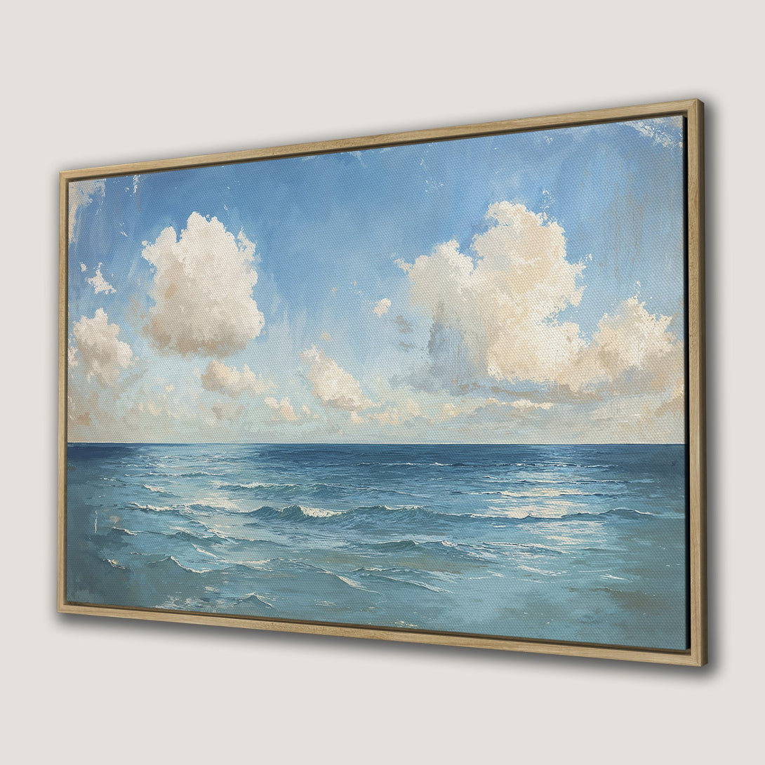 Framed Wall Art: Ocean scene canvas print. Blue and white seascape painting in a natural wood frame, perfect for coastal decor.