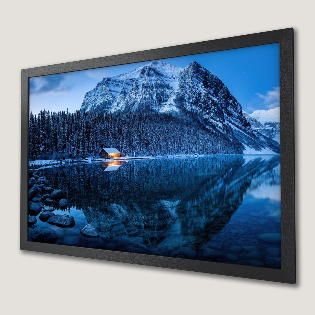 Framed Poster of a serene mountain lake scene in a cool blue color palette. Perfect wall art!