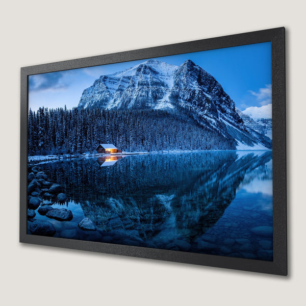 Framed Poster of a serene mountain lake scene in a cool blue color palette. Perfect wall art!