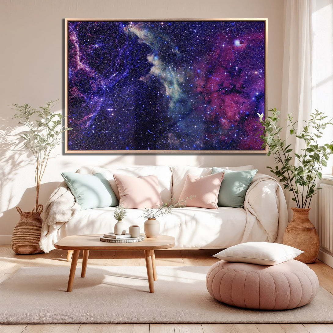 Framed Wall Art featuring a vibrant galaxy scene in purple and blue hues. Perfect for adding a touch of cosmic wonder to your living room decor.