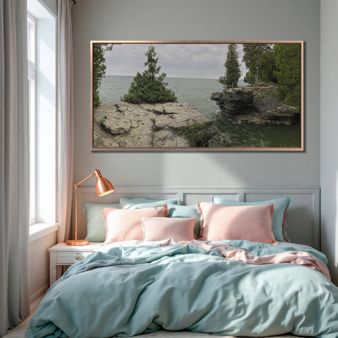 Framed Wall Art of a coastal landscape in a bedroom. Featuring a serene scene with green, gray, and pink color palette. Enhance your space with this art.