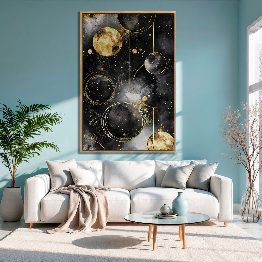Framed Wall Art: Abstract celestial design in black, gold, and gray. Modern Canvas Print adds elegance to any living room. Shop now for stylish home decor!