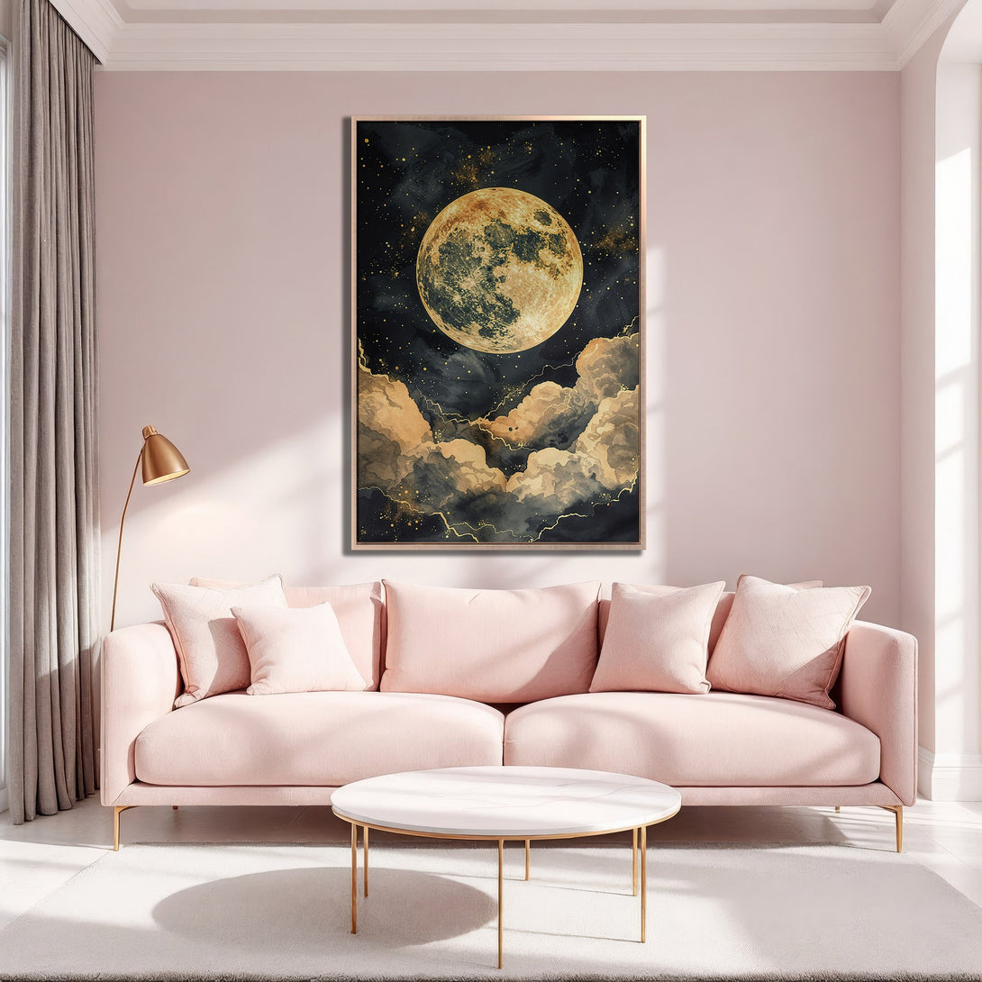 Framed Wall Art featuring a celestial moon & cloudscape in a gold and black palette, adding a touch of elegance to any space. Shop now!