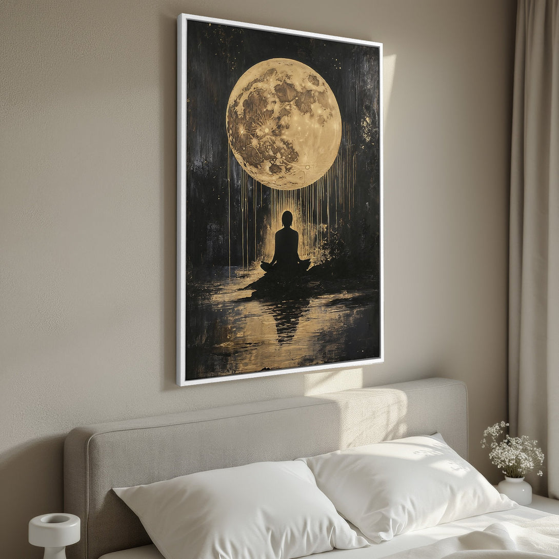 Framed Wall Art featuring a meditating figure under a golden moon, perfect for bedroom decor. Black, gold, and neutral color palette. Find your zen with this Canvas Print.