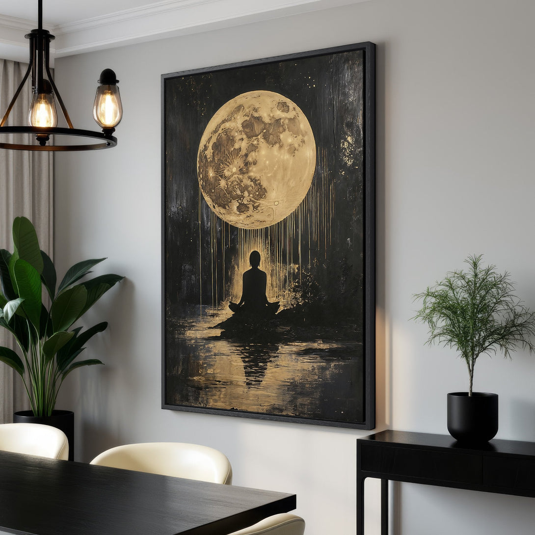 Framed Wall Art: Serene meditation scene with a golden moon and a black and gold color palette. Enhance your space with this stunning canvas print.