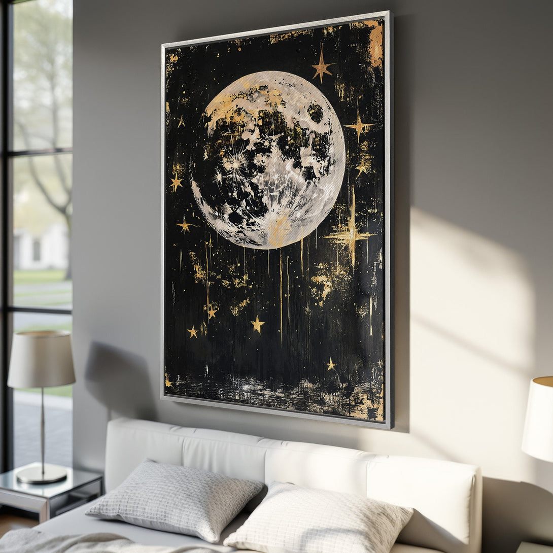 Framed Wall Art featuring a celestial moon and stars in a black and gold abstract style. Perfect for adding a touch of cosmic elegance to your space.