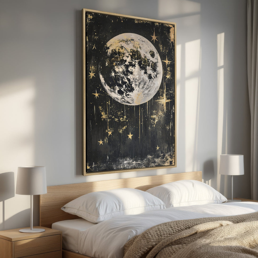 Framed Wall Art: Abstract moon and stars canvas print in a bedroom. Features a black, gold, and white color palette. Perfect for modern decor.