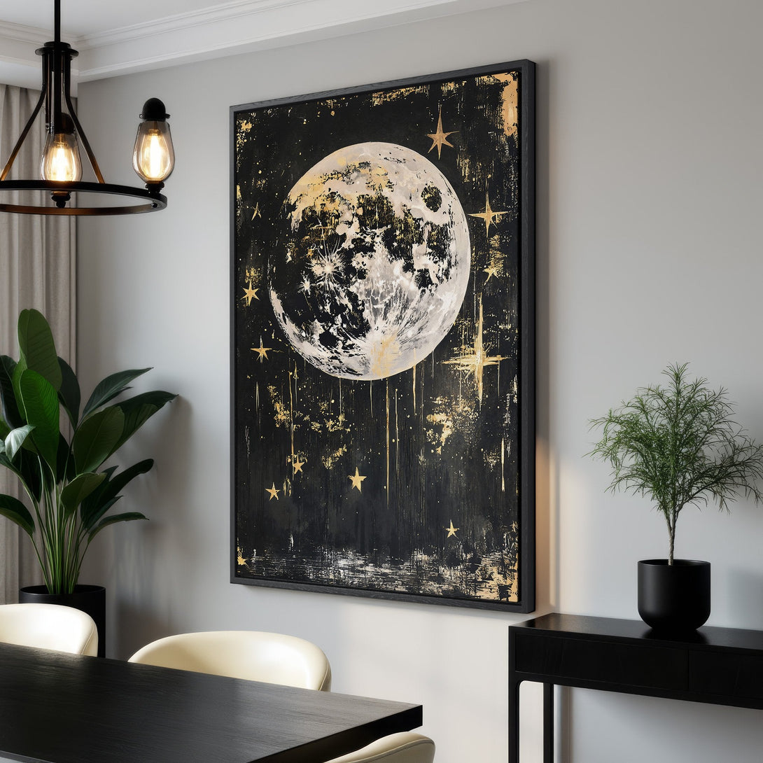 Framed Wall Art featuring a celestial moon and stars design with gold accents on a black background. Modern style, perfect for any interior.