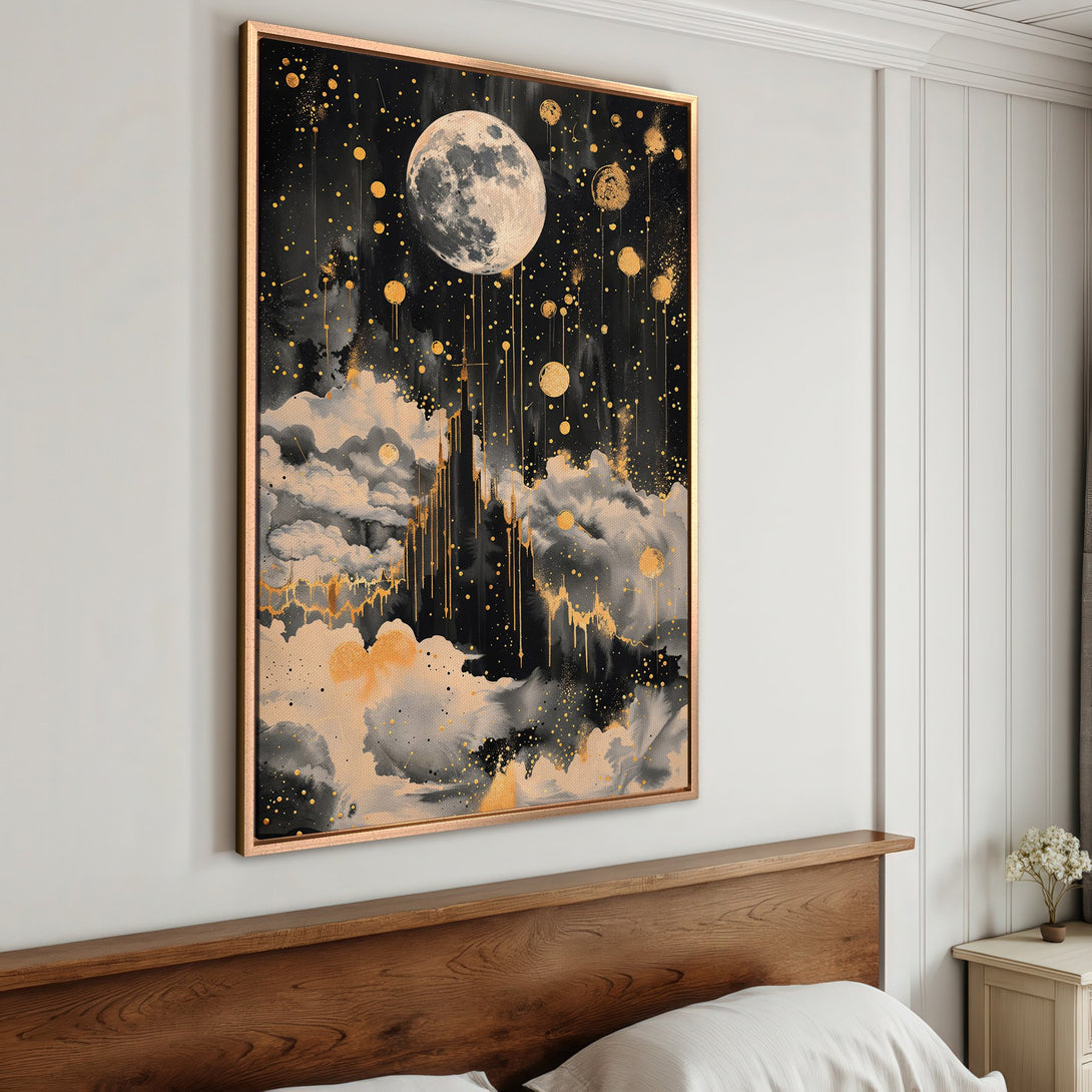 Framed Wall Art featuring a celestial moon and clouds in a modern, abstract style. The color palette includes black, gold, and neutral tones.