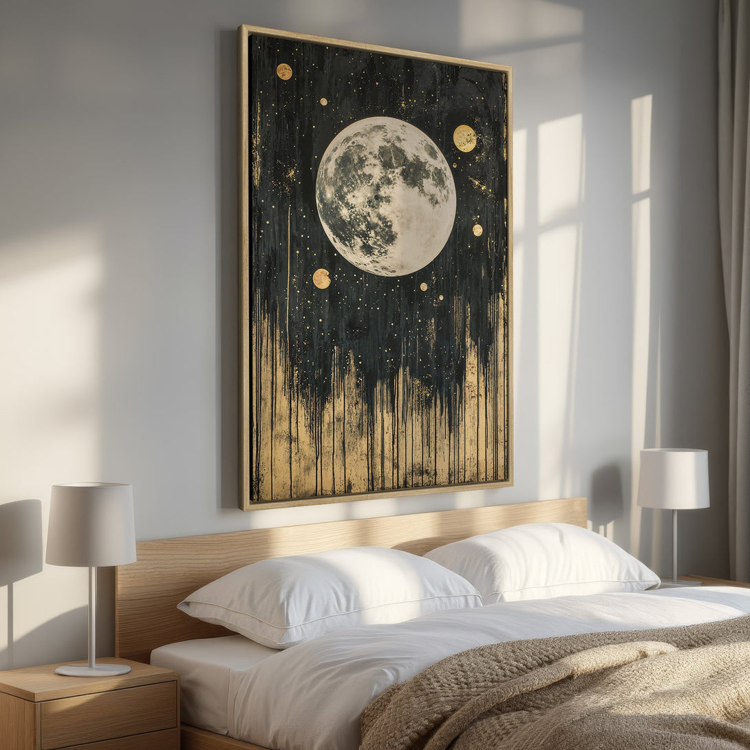 Framed Wall Art featuring a celestial moon and stars in a black and gold palette, adding a touch of modern elegance to a bedroom interior.