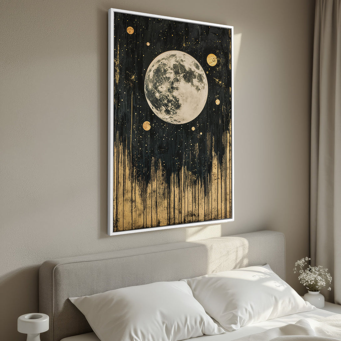Framed Wall Art featuring a celestial moon and stars design. Modern abstract style with a black, gold, and cream color palette. Perfect bedroom decor.