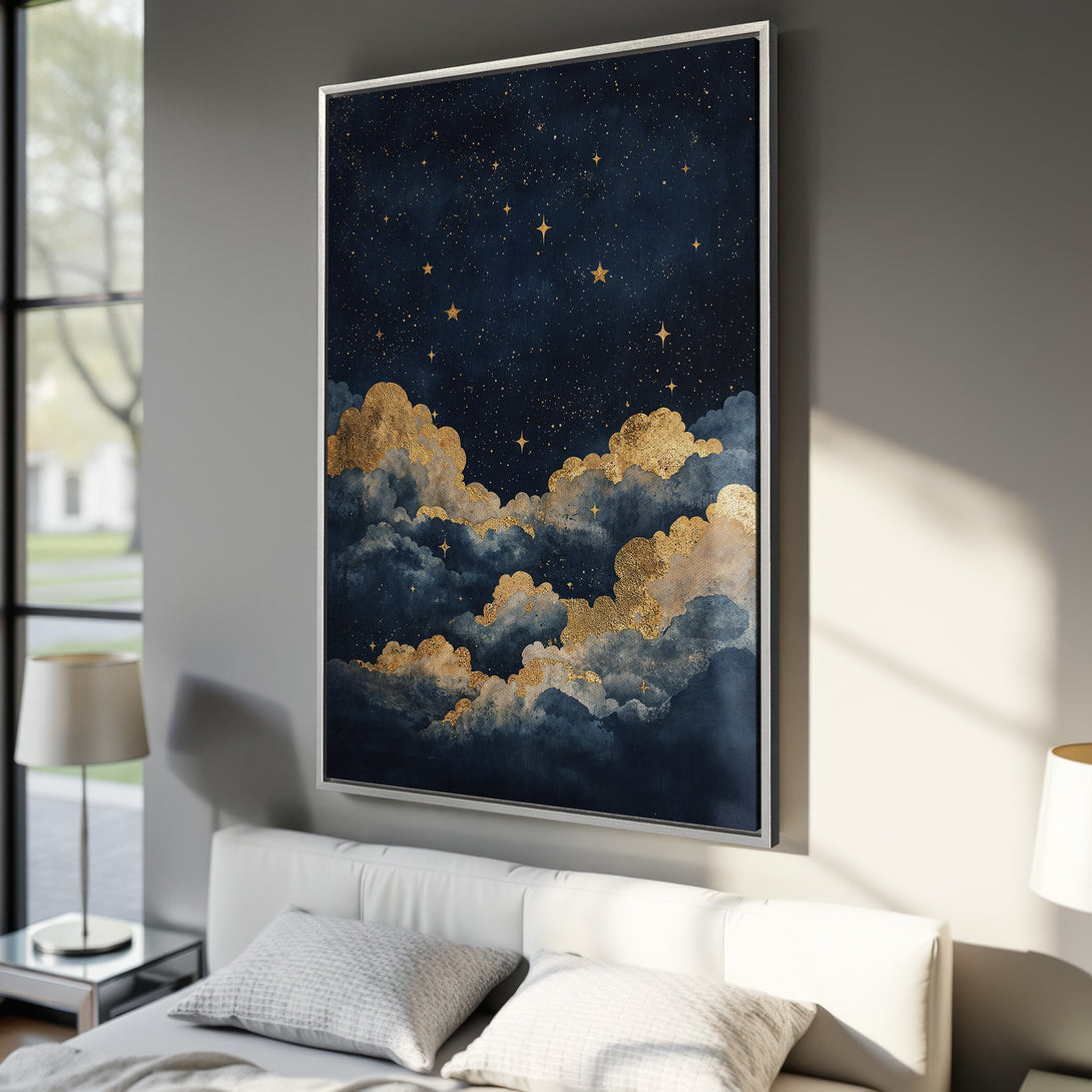 Framed Wall Art featuring a dreamy night sky with gold clouds and stars. Modern abstract style in a dark blue and gold color palette, perfect for bedroom decor.