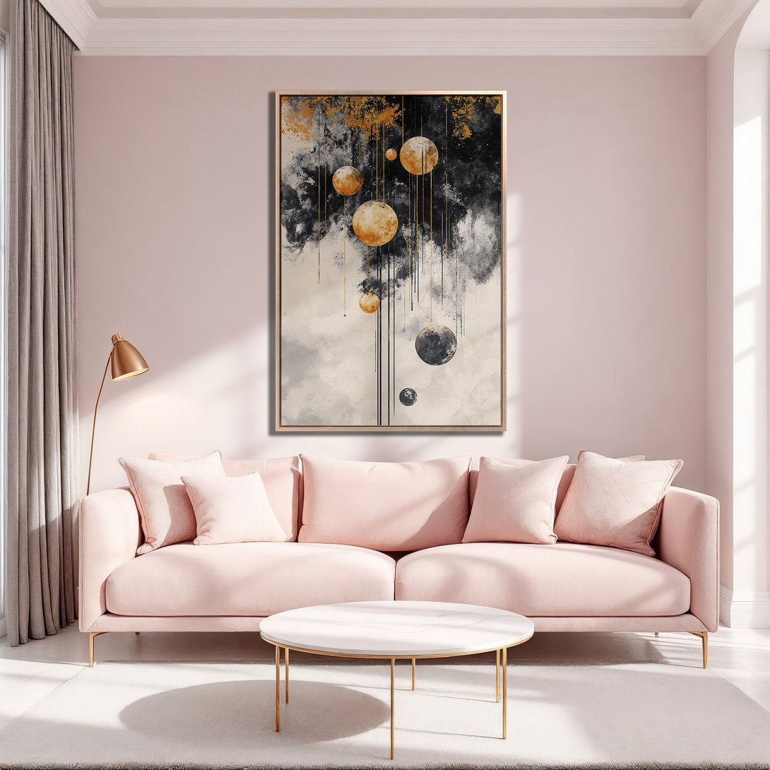 Framed Wall Art featuring an abstract celestial design in black, gold, and white. Modern art piece perfect for elevating your living room decor.
