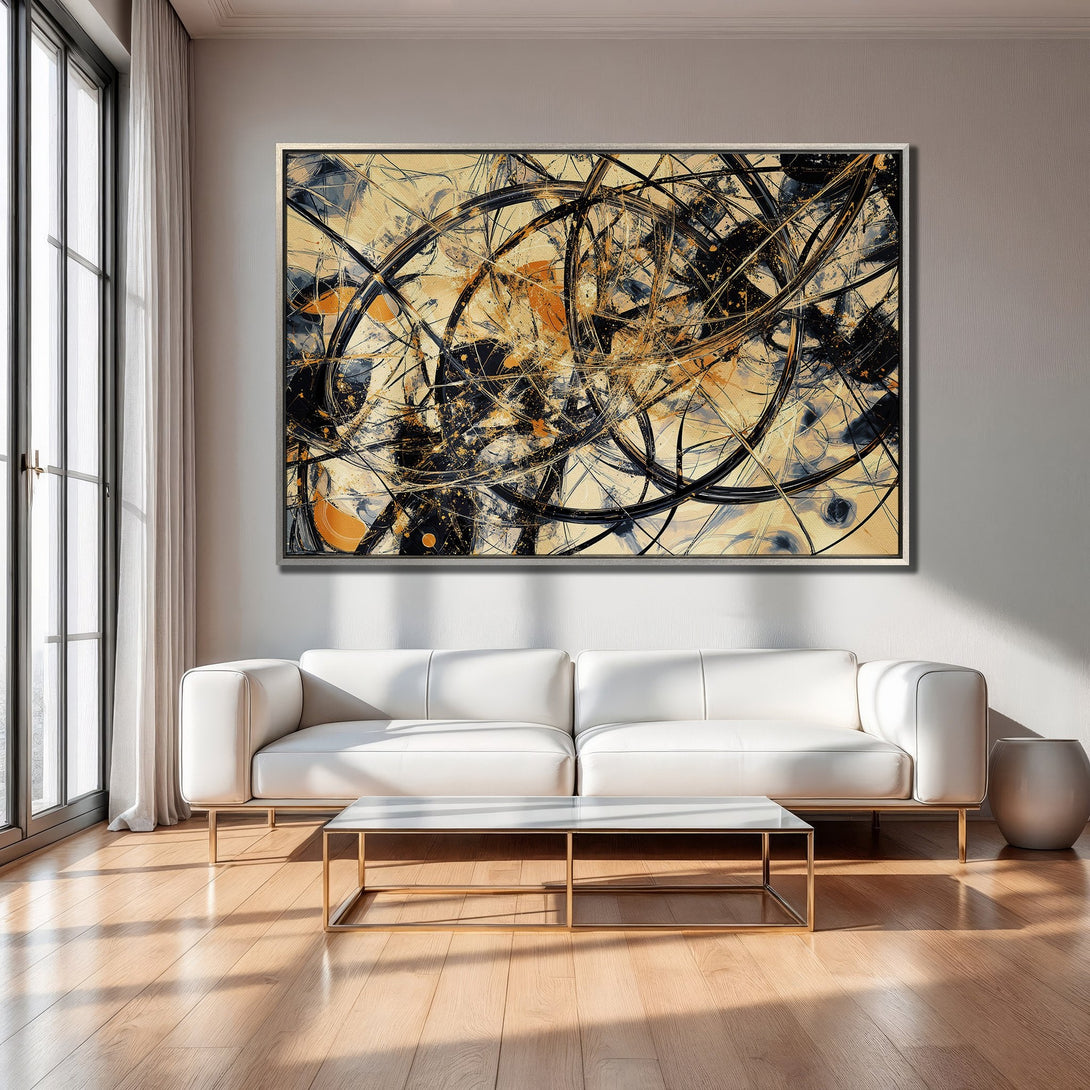 Framed Wall Art: Abstract art print in black, gold, and beige tones, displayed in a modern living room. Elevate your space with this stunning piece.