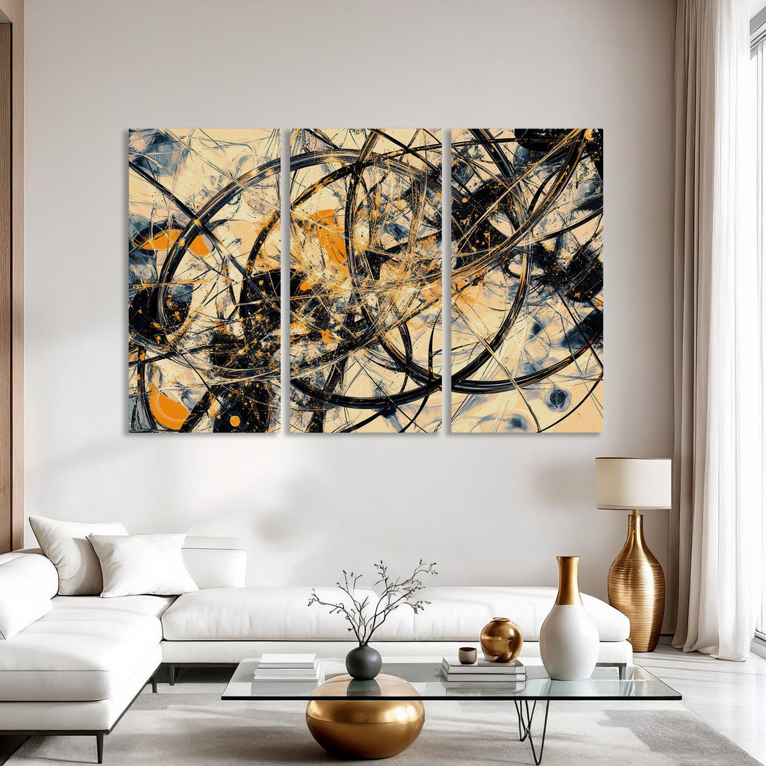 Abstract Canvas Print triptych art in a modern interior. Features a black, orange, and beige color palette. Perfect for living room decor.