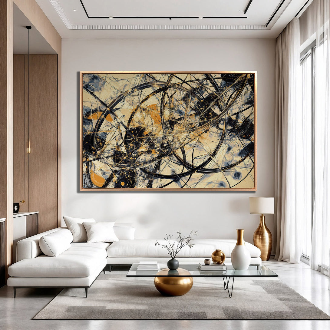 Framed Wall Art featuring an abstract black, gold, and beige design. Modern art canvas print adds a touch of luxury to any living room.