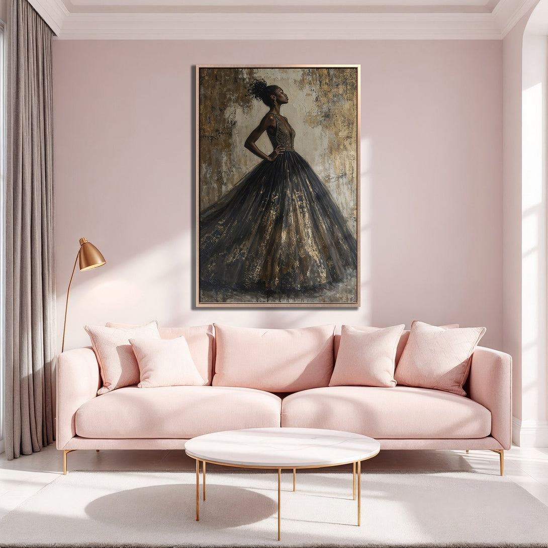 Framed Wall Art of elegant woman in black and gold dress, displayed in a blush pink interior. Modern art for a stylish home.