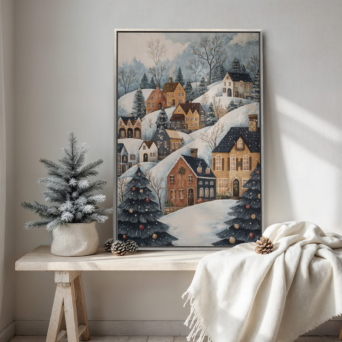 Framed Wall Art: Watercolor winter village scene in blue, white, and warm tones. Cozy holiday decor for your home.