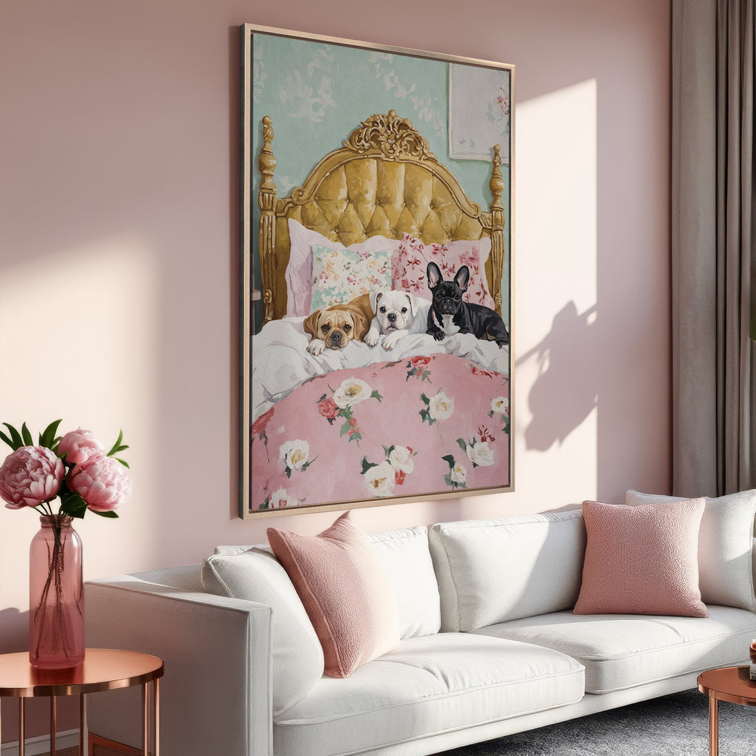 Framed Wall Art featuring adorable dogs on a bed in a soft pink and gold color palette, perfect for adding a touch of charm to any interior.