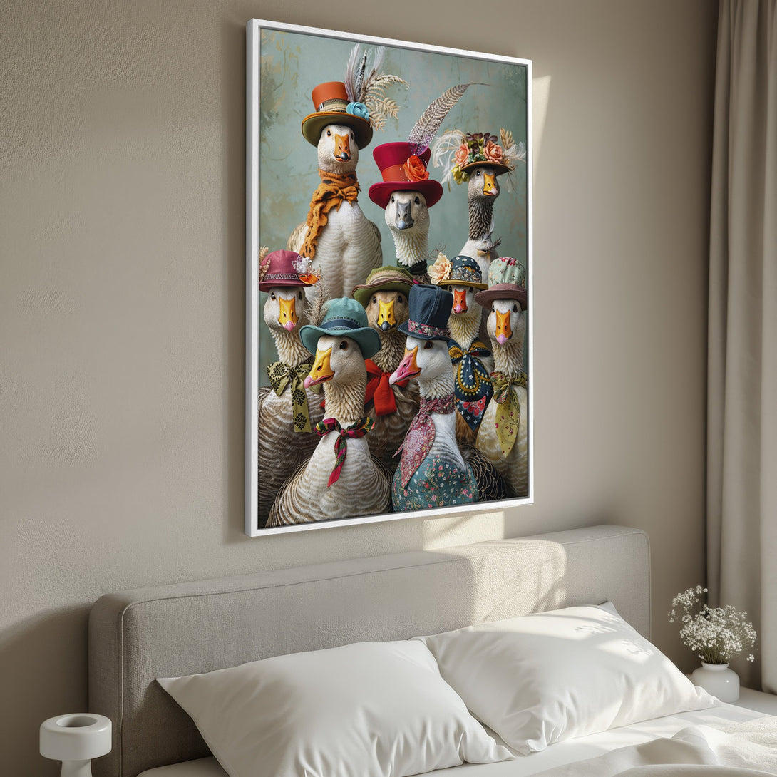 Framed Wall Art featuring whimsical geese in hats, displayed in a bedroom. Playful illustration with a soft, muted color palette. Perfect for unique home decor!