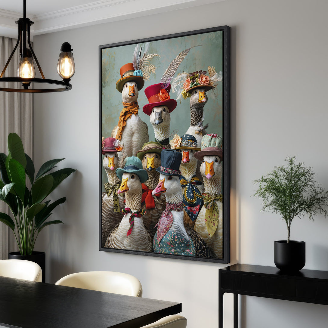 Framed Wall Art featuring whimsical geese portraits in hats, with a vintage style and a muted color palette. Perfect for adding character to any room.
