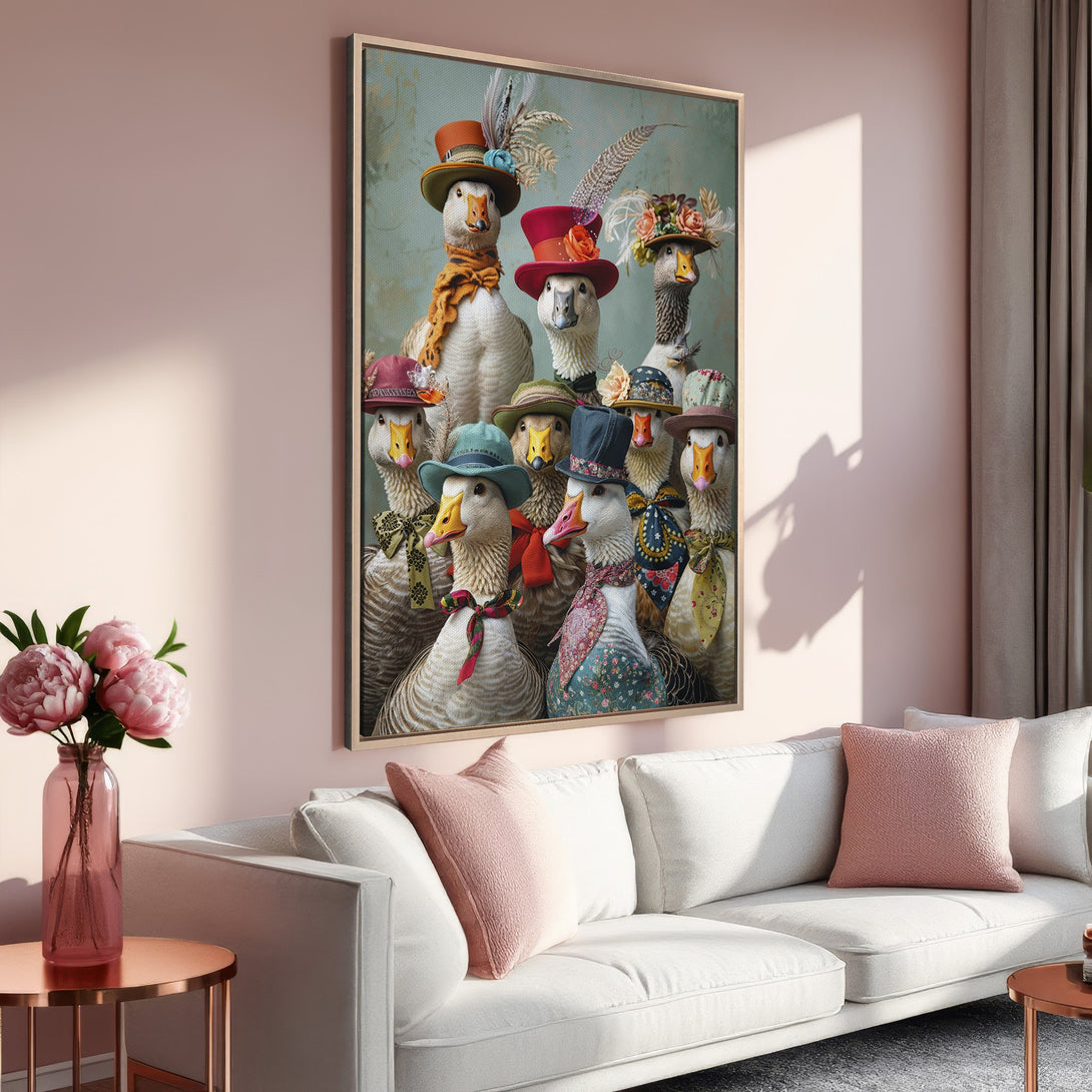Framed Wall Art featuring whimsical geese in hats, displayed in a modern interior. Soft pink and teal color palette, adding a touch of fun to your space.