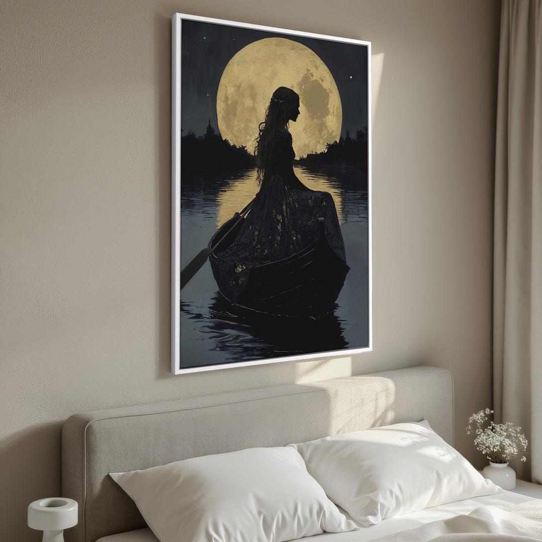 Framed Wall Art: Silhouette of a woman in a boat under a full moon. Dramatic, ethereal artwork with a dark and gold color palette. Perfect for bedroom decor.