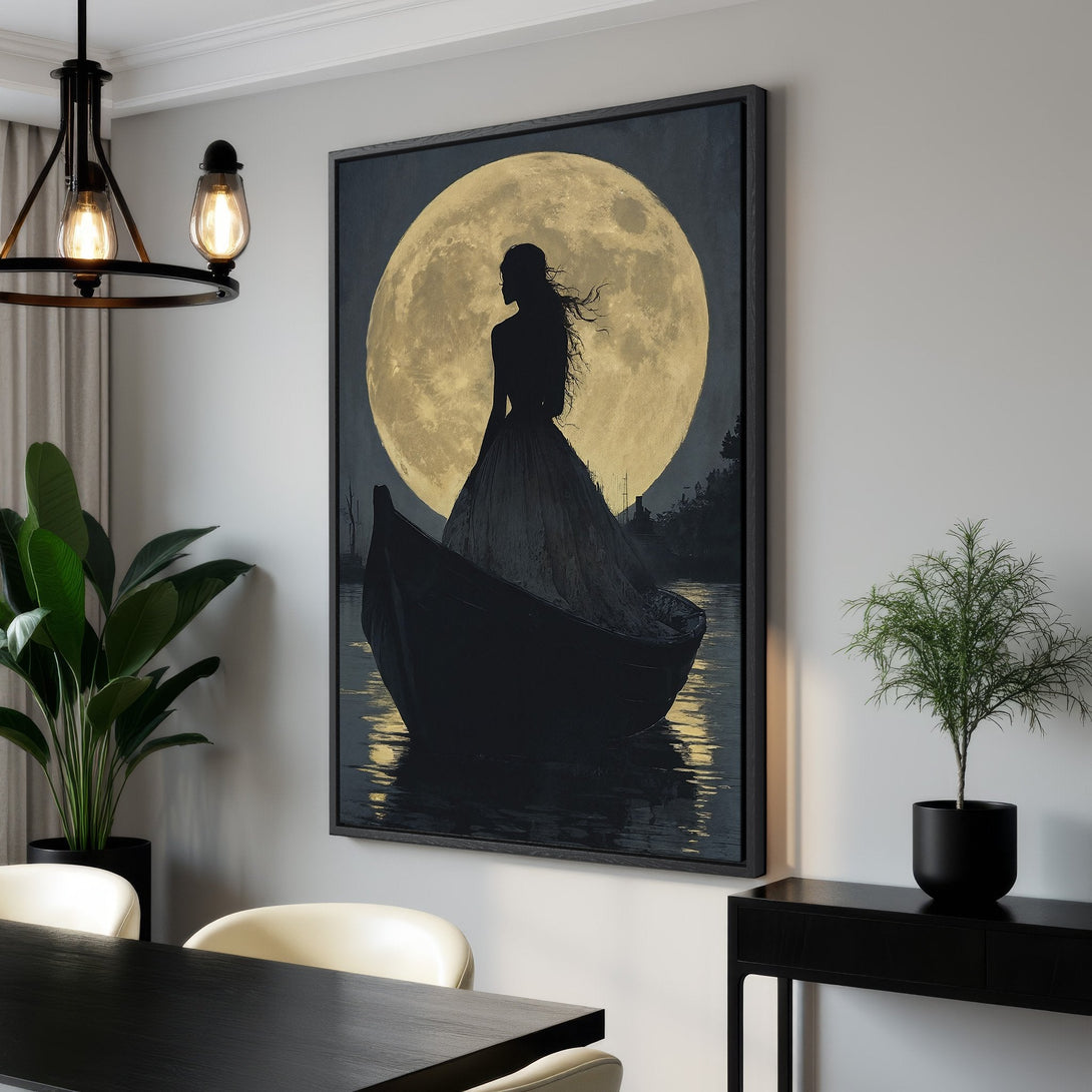 Framed Wall Art: Silhouette of woman in boat against moon, moody style. Black, gold, and blue color palette, perfect for modern interior decor.