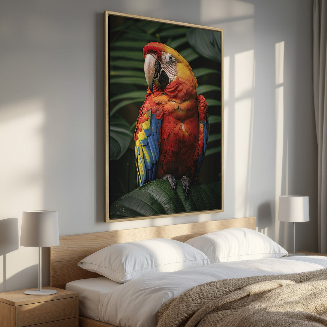 Framed Wall Art featuring a vibrant parrot in a lush green setting. Bring nature's beauty indoors with this stunning canvas print, showcasing a rich red, yellow, and blue color palette.