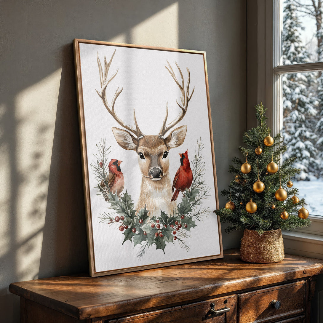 Framed Wall Art featuring a watercolor deer and cardinals. Rustic style, warm neutral tones with pops of red and green. Perfect for holiday decor!