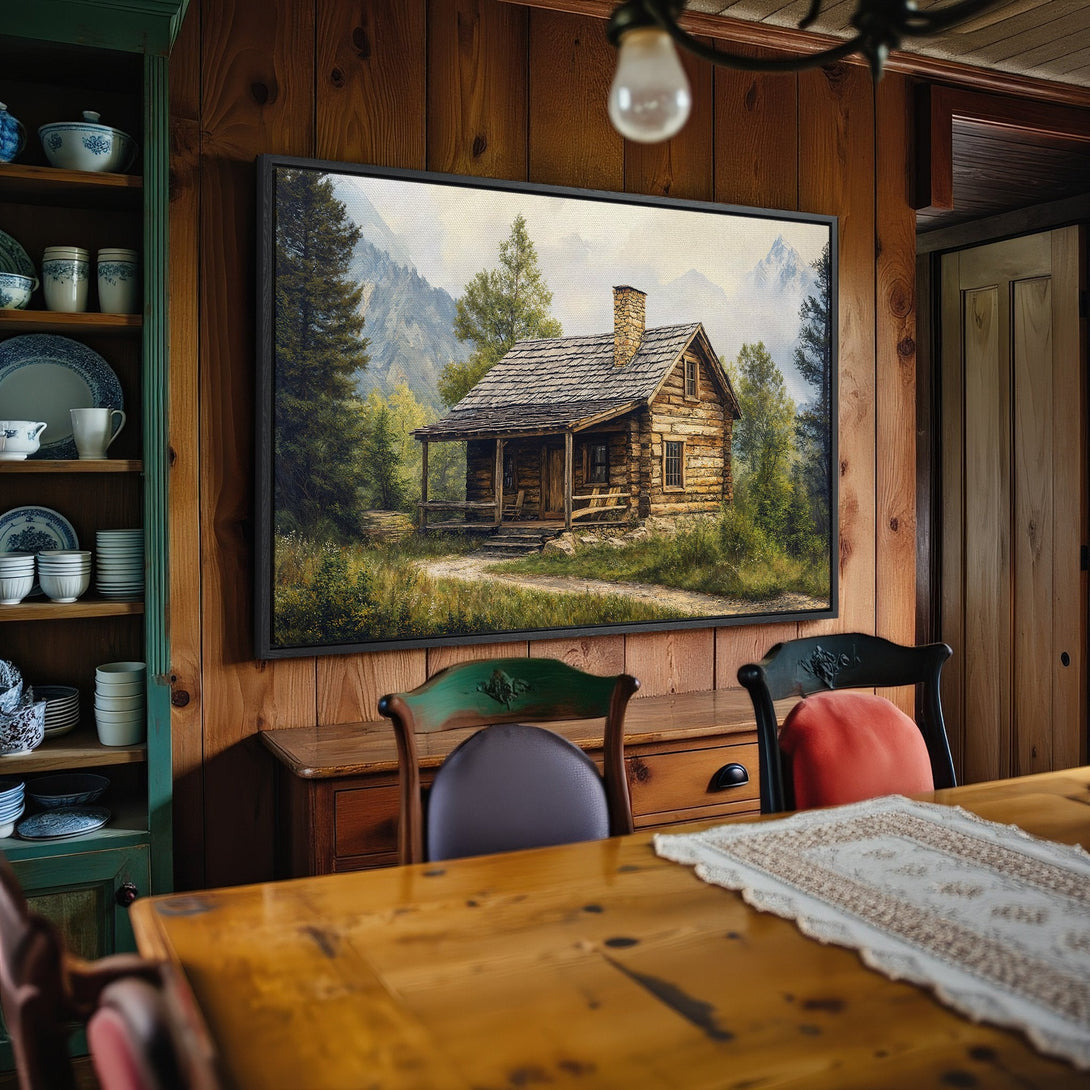 Framed Wall Art Canvas Print of a rustic cabin in a mountain landscape. Earthy tones and a cozy, inviting style perfect for home decor.