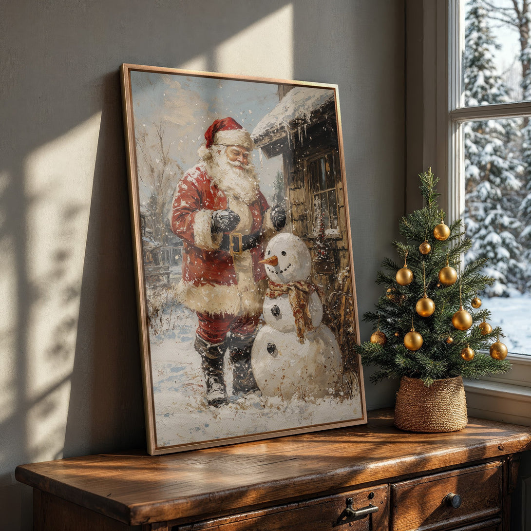 Framed Wall Art featuring Santa Claus and a snowman in a vintage style. Warm red and winter blue color palette, perfect for festive home decor.