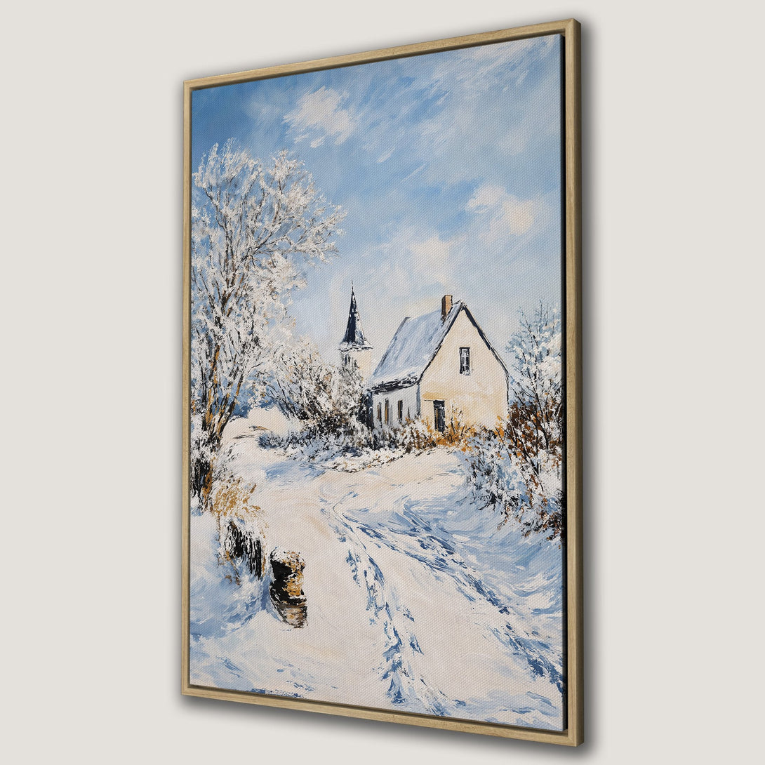 Framed Wall Art: Winter landscape Canvas Print with a snowy scene, featuring a house and church. Blue, white, and beige color palette. Perfect for cozy decor.