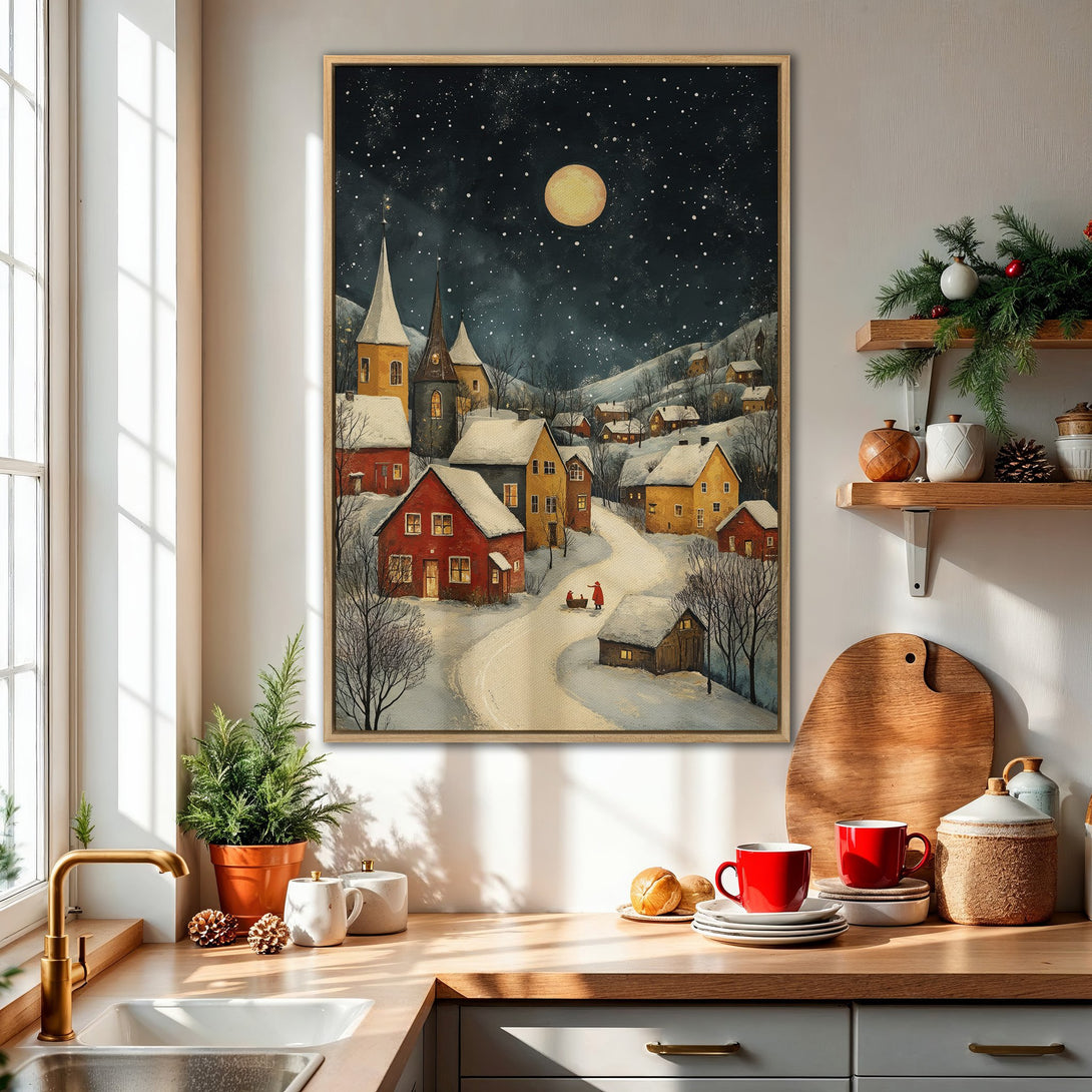 Framed Wall Art: Winter village scene with warm red and yellow hues, under a starry night sky. Perfect for cozy home decor.