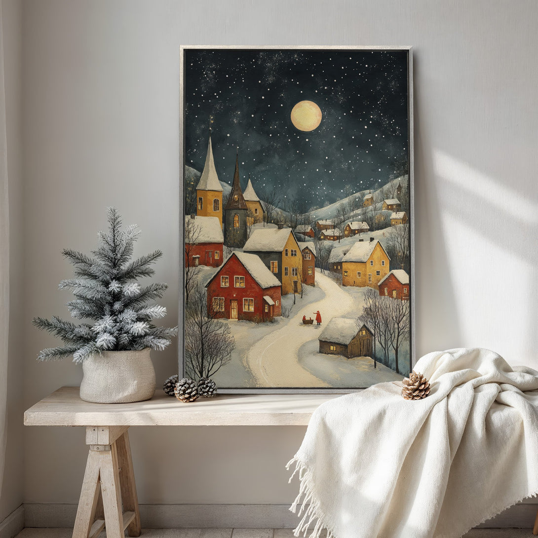 Framed Wall Art: Winter village scene in a watercolor style, featuring a snowy landscape and warm, inviting colors. Perfect for cozy home decor.