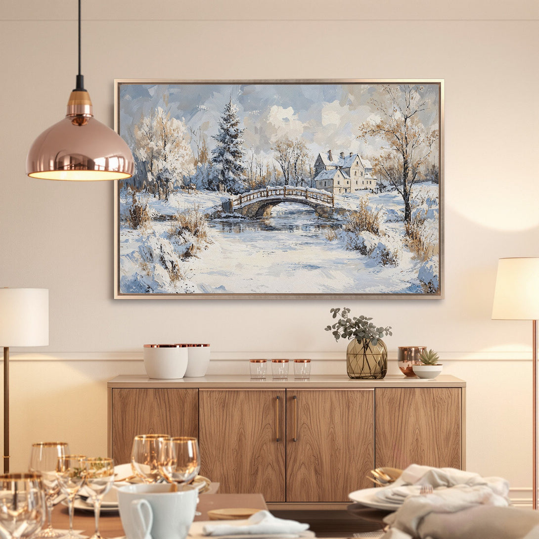 Framed Wall Art: Winter landscape Canvas Print with a bridge, houses, and snowy scene. Soft blue and beige color palette, perfect for home decor.