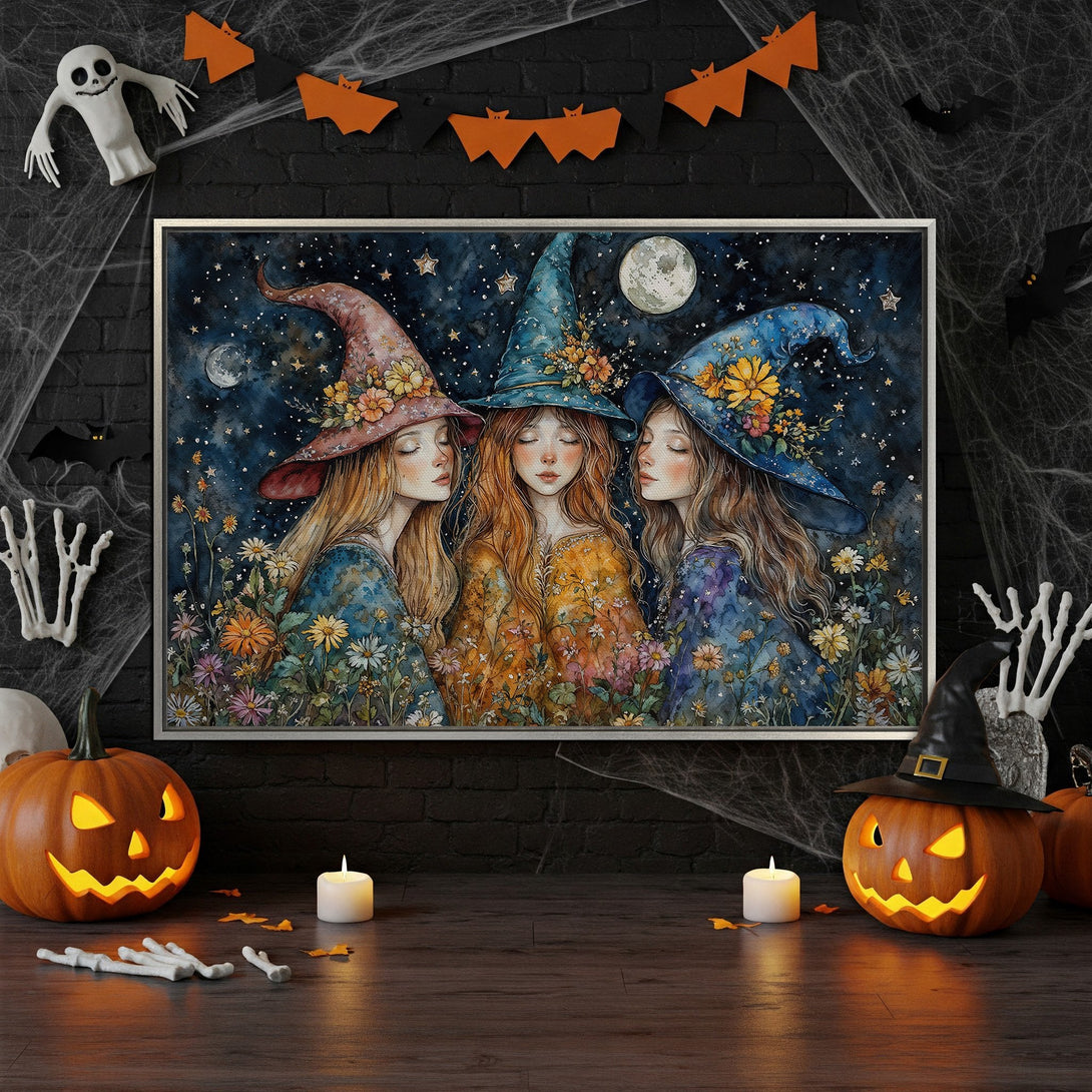 Framed Wall Art: Watercolor witches under a starry night sky. Perfect Halloween decor! Featuring a blue, orange, and purple color palette. Add a touch of magic!