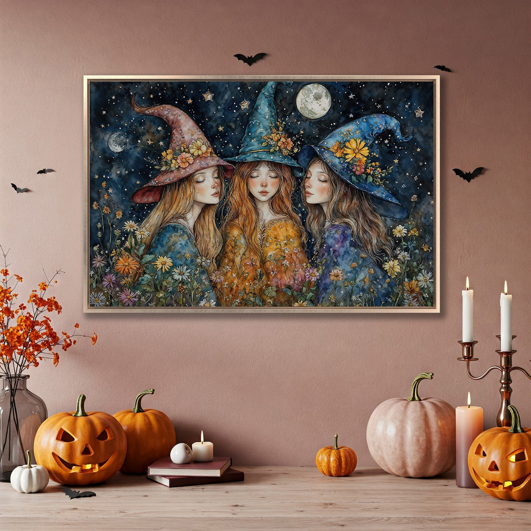 Framed Wall Art featuring whimsical watercolor witches with floral hats, set against a starry night sky. Enchanting, colorful, and perfect for Halloween decor.