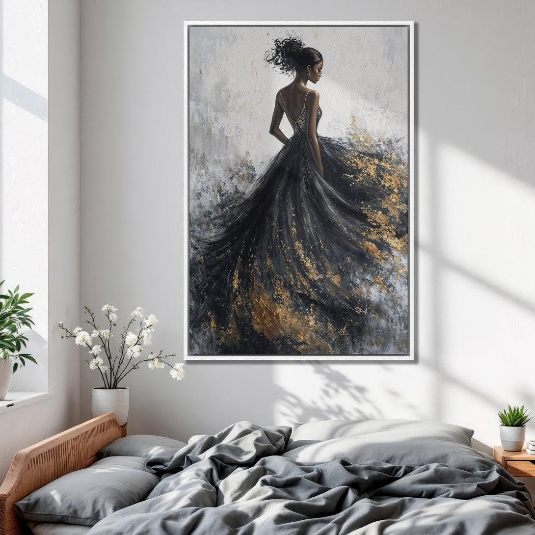 Framed Wall Art: Elegant woman in black & gold dress. Abstract art style, neutral tones with gold accents. Perfect bedroom decor.